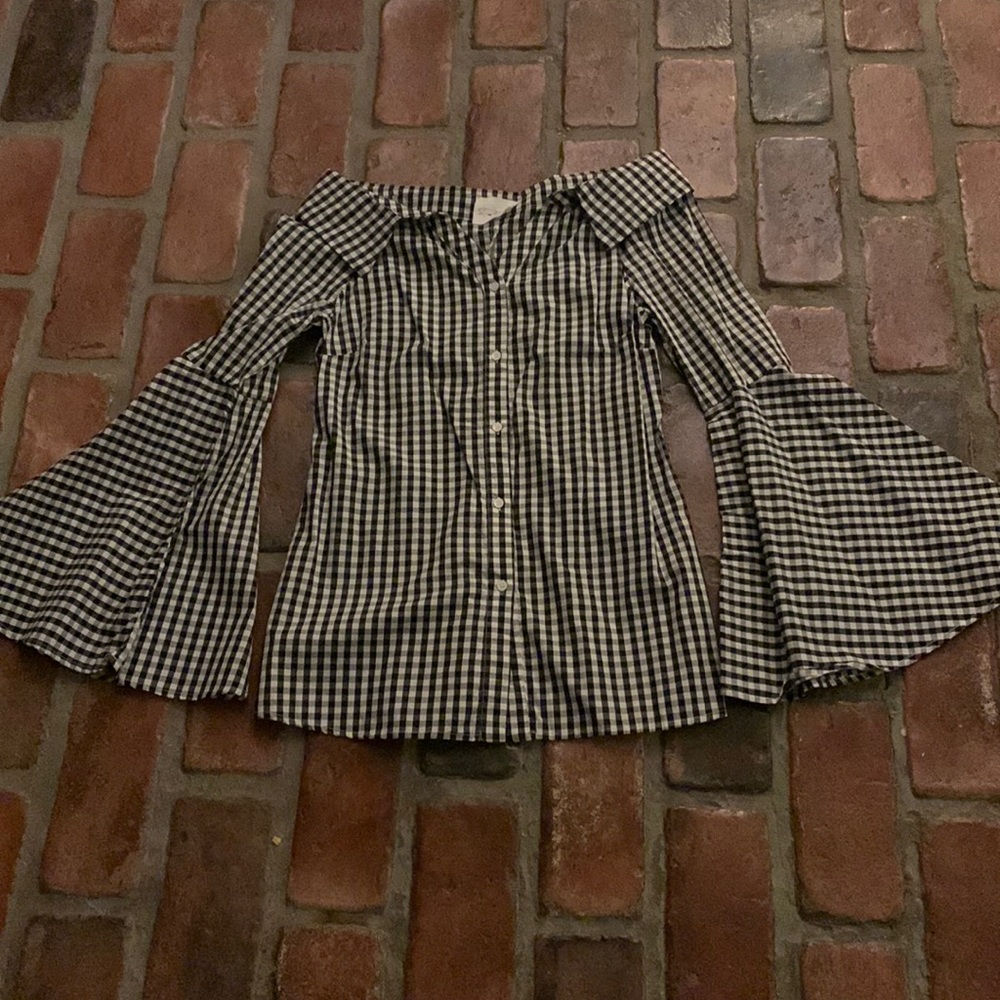 Off-shoulder, gingham blouse.